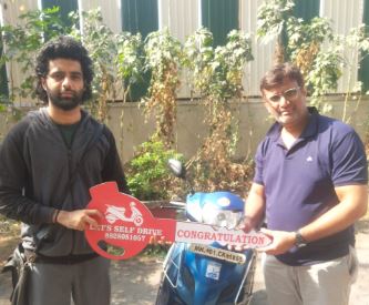 Karan with his TVS Ntorq